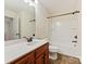 Bathroom with single vanity, tub, and shower at 1018 Archibald Ave, Fort Mill, SC 29708