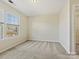 Bright bedroom with neutral walls and carpet flooring at 1018 Archibald Ave, Fort Mill, SC 29708