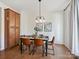 Dining room with hardwood floors and built-in cabinetry at 1018 Archibald Ave, Fort Mill, SC 29708