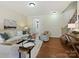 Light-filled living room with hardwood floors and view of entry at 1018 Archibald Ave, Fort Mill, SC 29708