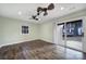 Bedroom featuring hardwood floors, natural light, and an outdoor view at 1019 Palmyra Dr, Tega Cay, SC 29708