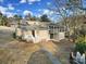 Beautiful two-story home with neutral siding, a screened porch, and a walkway at 1019 Palmyra Dr, Tega Cay, SC 29708