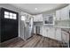 Modern kitchen featuring stainless steel appliances, white cabinets, and stylish backsplash at 1019 Palmyra Dr, Fort Mill, SC 29708