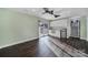 Bright living space featuring hardwood floors, white cabinets, and a sliding glass door at 1019 Palmyra Dr, Fort Mill, SC 29708