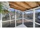 Cozy screened porch featuring a wood ceiling, and views of the treed yard at 1019 Palmyra Dr, Tega Cay, SC 29708