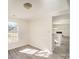 Bright dining area with natural light, hardwood floors, and elegant trim at 10718 Downpatrick Pl, Charlotte, NC 28262