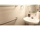 Cozy powder room with modern sink and neutral walls at 10946 Garden Oaks Ln, Charlotte, NC 28273