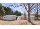 Aerial view showcasing house, detached garage, and large yard at 115 E Texas Ave, Bessemer City, NC 28016