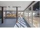 Sunroom with view of backyard and garage at 115 E Texas Ave, Bessemer City, NC 28016