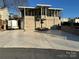 Brick house exterior with screened porch and attached garage at 130 Badin Lake Cir, New London, NC 28127