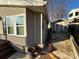 Tan mobile home with shed and landscaped yard at 130 Badin Lake Cir, New London, NC 28127