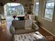 Living room with lake views and access to a deck at 130 Badin Lake Cir, New London, NC 28127