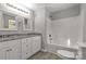 Bathroom with a double vanity, granite countertop, and a shower-tub combo at 1345 Mack Dr, McConnells, SC 29726