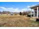 Large backyard with open space and partial view of neighboring properties at 15918 Big Bear Rd, Albemarle, NC 28001