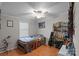 Cozy bedroom with wood floors and a ceiling fan at 15918 Big Bear Rd, Albemarle, NC 28001