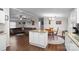 Open kitchen features granite countertops and white cabinets at 15918 Big Bear Rd, Albemarle, NC 28001