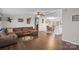 Open living and dining area with L-shaped sofa at 15918 Big Bear Rd, Albemarle, NC 28001