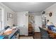 Home office with rocking chair and built-in shelving at 15918 Big Bear Rd, Albemarle, NC 28001