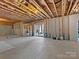 Unfinished basement with high ceilings and ample space at 16400 Cozy Cove Rd, Charlotte, NC 28278