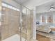 Bathroom with a large shower and built-in bench at 16400 Cozy Cove Rd, Charlotte, NC 28278