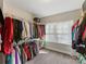 Large walk-in closet with ample hanging space at 16400 Cozy Cove Rd, Charlotte, NC 28278