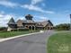 Elegant clubhouse with stone facade and landscaping at 16400 Cozy Cove Rd, Charlotte, NC 28278