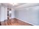 Bedroom with hardwood floors and light gray walls at 1648 Newton Dr, Statesville, NC 28677