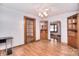 Charming dining room featuring a built-in hutch and elegant glass-paneled doors at 1648 Newton Dr, Statesville, NC 28677