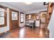 Dining room with wood flooring, a table for four, and an open view into the kitchen at 1648 Newton Dr, Statesville, NC 28677