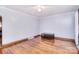 Cozy living room with hardwood floors and a dark wood coffee table at 1648 Newton Dr, Statesville, NC 28677