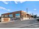 A brick building with large windows, housing Platform Coffee and Kitchen, with modern architectural details and inviting signage at 2149 Highland St, Charlotte, NC 28208