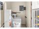 Functional laundry room with a washer, dryer, and utility sink, providing convenience at 226 Bradley Farm Rd, Statesville, NC 28625