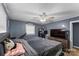 Cozy bedroom with hardwood floors, ceiling fan and closet, perfect for relaxation at 226 Bradley Farm Rd, Statesville, NC 28625