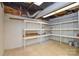 Unfinished basement provides ample storage with open shelving and potential for customization at 236 Ervin Rd, Mooresville, NC 28117