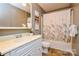 Bathroom features a vanity, mirror, and tub-shower combination at 236 Ervin Rd, Mooresville, NC 28117