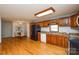 Spacious kitchen featuring ample cabinet space, modern appliances, and an adjacent dining area at 236 Ervin Rd, Mooresville, NC 28117