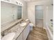 Bathroom features granite countertops, a double vanity, and a tub at 271 Wendover Dr, Salisbury, NC 28147