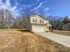 Two-story house with beige siding and a large yard at 271 Wendover Dr, Salisbury, NC 28147