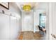 Welcoming foyer with hardwood floors, coat hooks, and a charming light fixture at 2727 Cypress Oak Ln, Gastonia, NC 28056