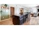 Open concept kitchen island, blending into the living space, perfect for entertaining and Gathering time at 2727 Cypress Oak Ln, Gastonia, NC 28056