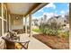 Inviting covered front porch with seating, decorative accents, and a view of the neighborhood at 2727 Cypress Oak Ln, Gastonia, NC 28056