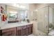 Modern bathroom with large shower, double vanity, and plenty of counter space at 328 Sensibility Cir, Fort Mill, SC 29708