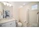 Clean bathroom with a walk-in shower and updated fixtures at 328 Sensibility Cir, Fort Mill, SC 29708