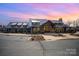 Community clubhouse with stone accents and metal roof at 328 Sensibility Cir, Fort Mill, SC 29708