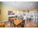 Kitchen and dining area with hardwood floors and large windows at 328 Sensibility Cir, Fort Mill, SC 29708