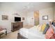 Main bedroom features king bed, dresser, and calming decor at 328 Sensibility Cir, Fort Mill, SC 29708