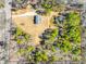 Aerial view with property line showing home surrounded by woods at 3331 Center Rd, Chester, SC 29706