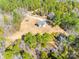 Aerial view of house surrounded by lush trees and a long driveway at 3331 Center Rd, Chester, SC 29706