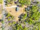 Bird's eye view shows a home nestled in a forested area, accessible via a lengthy driveway at 3331 Center Rd, Chester, SC 29706