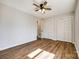 Bedroom includes wood-look floors, ceiling fan and closet at 3331 Center Rd, Chester, SC 29706